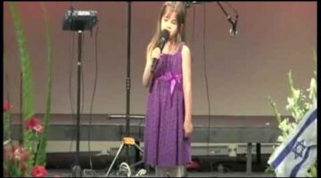 7 Year-Old Sings at Grandfather’s Funeral