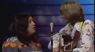 Leaving On A Jet Plane – John Denver & Cass Elliot (1972)